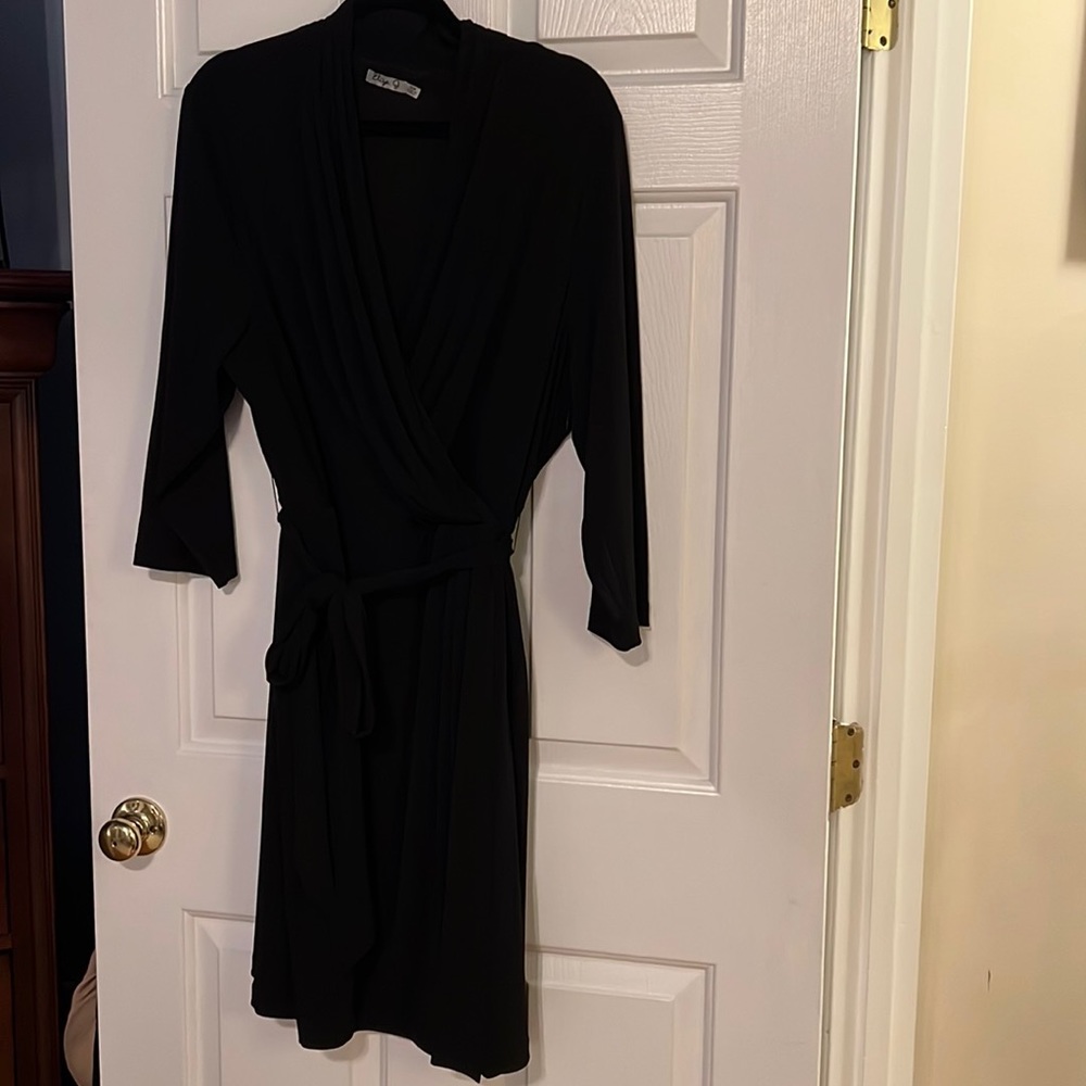 Eliza J matte jersey black dress with cross v neck and tie belt.